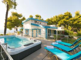 Sani Beach Gallery Villa, your next family vacation!, hotel with jacuzzis in Sani Beach