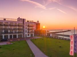 Apartamenty Przy Latarni Kropla Bałtyku, location près de la plage à Darłówko