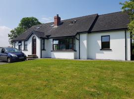 Welcome Rest Holiday Home, hotel amb aparcament a Ballintoy