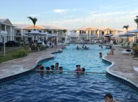 condomínio Mar da Galiléia, ξενοδοχείο σε Coroa Vermelha