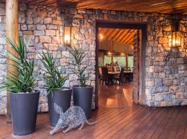 aha Thakadu River Camp, casa de muntanya a Reserva natural de Madikwe