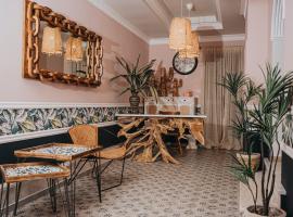 Parthenon Art Executive Wing, hotel en Olympiakí Aktí