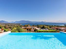 Villa Perla con piscina by Wonderful Italy, alquiler vacacional en Barcuzzi