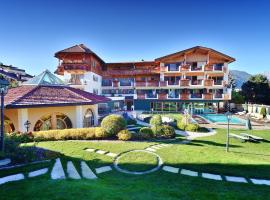 Mirabell Dolomites Hotel Luxury Ayurveda & Spa, golf hotel in Valdaora