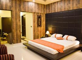 Royal Inn Hotel, hotel poblíž Mezinárodní letiště Jinnah - KHI, Karáčí