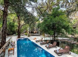 SaffronStays Odeon - art-deco heritage home with heated pool, private forest lawn and terrace, cheap hotel in Khandala