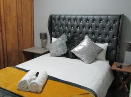 Bountyful Guest House, hotel s parkiralištem u gradu 'Bloemfontein'