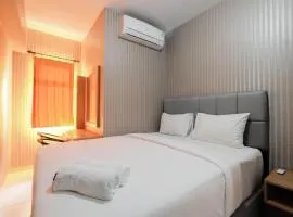 Relaxing 2BR Apartment at The Springlake Summarecon By Travelio