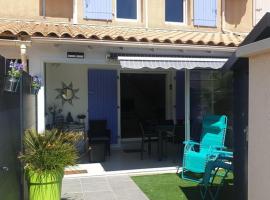 Villa tout confort dans résidence privée avec piscine à 500m de la plage - Climatisation, WIFI, parking, Hotel in Portiragnes
