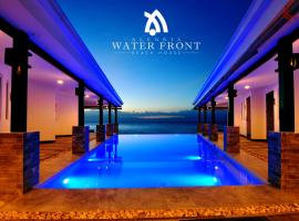 Alegria Water Front Beach House, hotel dekat Air Terjun Kawasan, Alegria