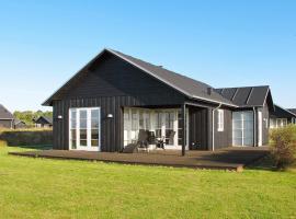 8 person holiday home in Nysted, bolig ved stranden i Nysted