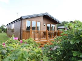 Cosy Dreams Lodge, hotel cerca de Reserva Natural de Lindisfarne, Beal