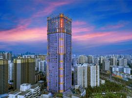 Haikou Mingguang Shengyi Hotel (Previous Mingguang International Hotel) – hotel w pobliżu miejsca Lotnisko Haikou-Meilan - HAK w mieście Haikou