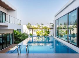Mövenpick Luxury Villa2FL-Private Pool-SHA CERTIFIED, cabana o cottage a Na Jomtien