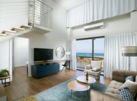 Marine Heights Suites, hotell i Herzelia 