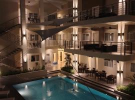 Rovira Suites, отель в городе Думагете