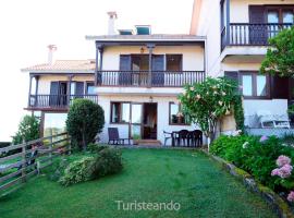 Chalet Las Calzadas - Jardín, parking y vistas increíbles, familiehotel in San Vicente de la Barquera