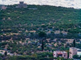 Guesthouse Toxotis, hotel em Pirgos Dhirou