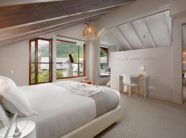 Hotel Boutique Mediod&iacute;a & Apartments，普拉恩的住宿