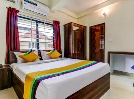 Treebo Trip Rain Tusi Stayz Palarivattom, hotel in Cochin