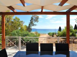 Porto Assini, hotel in Tolo