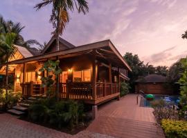 Nature's Abode - The Wooden Villa at Morjim by StayVista, hotel in Morjim