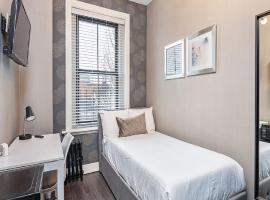 Suites At 143 Arlington Street、ボストンのアパートメント