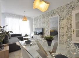 Luminoso y coqueto apartamento con jard&iacute;n