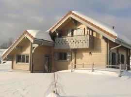 Chalet Flocon, hotel with parking in Plénise