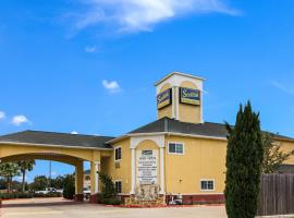 Scottish Inn and Suites Baytown, хотел в Бейтаун