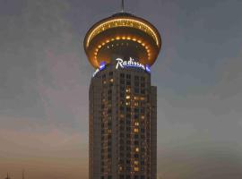 Viesnīca Radisson Blu Hotel Shanghai New World Šanhajā