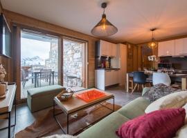 ODYSSEE ERJ01 Appartement avec terrasse et acces aux pistes, Hotel in La Toussuire