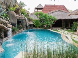 Puri Samaira, hotel com piscina em Tanjung