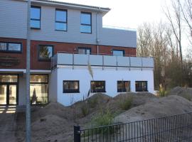 Dünenhaus Wohnung 7, hotel in Lübeck
