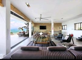 Luxury 4 Bedroom/4 Bathroom Beach Villa Kallaya, casa rústica em Thong Son Beach