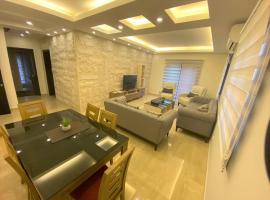 Elite Residence - Furnished Apartments，An Nakhlah的度假住所