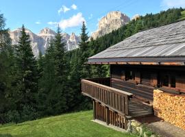 Baita Toè, chalet de montaña en Canazei