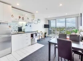 Cityscape Charm Apt w Parking, Views, Pool & Gym