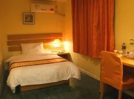 Shell Xinyu City Railway Station Plaza Hotel