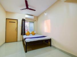 SPOT ON 66458 Hotel Vighnaghar Lodge, hotel v destinaci Arwi