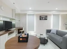 Elegant and Comfy Studio Azalea Suites Apartment Cikarang By Travelio