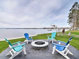 Lakefront Cadillac Home with Dock, Fire Pit and Grill!, hotel in Cadillac