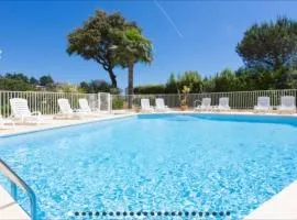 Cozy studio with sea view, swimming pool and greenery