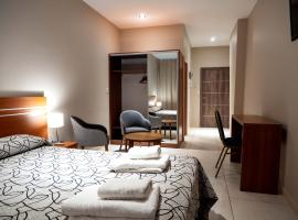 LELOIR Suites & Meetings, hotel di Neuquén