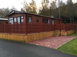 81 The Heathers, Aviemore Holiday Park , Dalfaber rd Aviemore PH22 1PX, villa in Aviemore