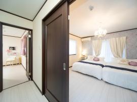 Awaji Central Inn Kuruma713, hótel í Awaji