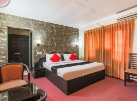 Capital O 66099 Hotel Zodiac, ξενοδοχείο σε Kottayam