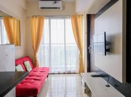 Homey 2BR at Serpong Greenview Apartment By Travelio