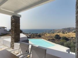 modern apartment with a sea view and swimming pool in Koundouros, hotel en Koundouros