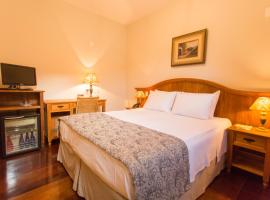 奥普拉太阳酒店，位于欧鲁普雷图的酒店